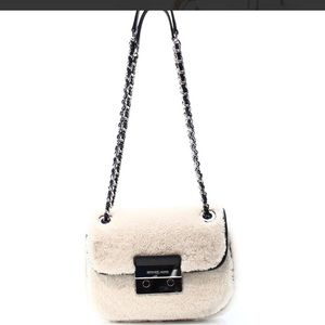 Michael Kors Sloan shearling crossbody bag.